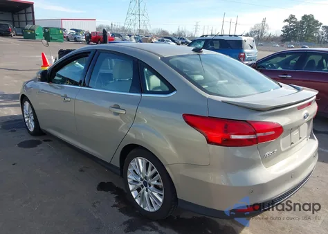 2015 Ford Focus Titanium из США, поврежденный, VIN 1FADP3J23FL373450